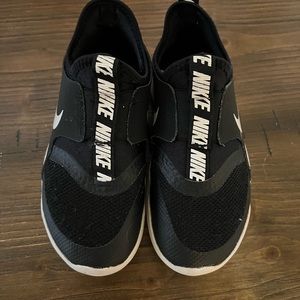 2 pairs of Nike slip on sneakers